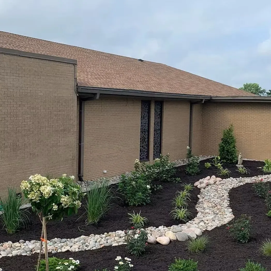 French drain and drainage solution project near Grandview, MO completed by Volz Lawn & Landscape