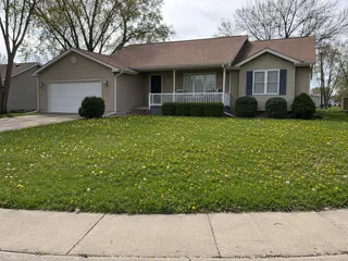Dandelions blooming in the lawn of a Kansas City home
