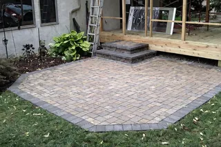 Custom hardscape patio built by Volz Lawn & Landscape for a Mission, KS homeowner